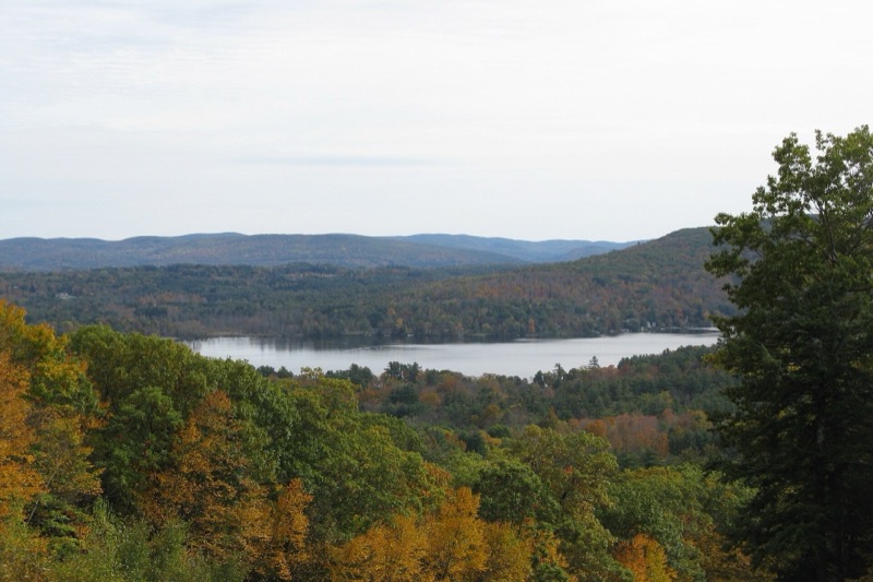 Autumn foliage around Stockbridge Bowl lake in the Berkshires, Massachusetts