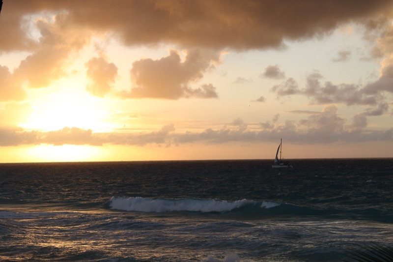 Sunset and a sailboat off Bimini, Bahamas